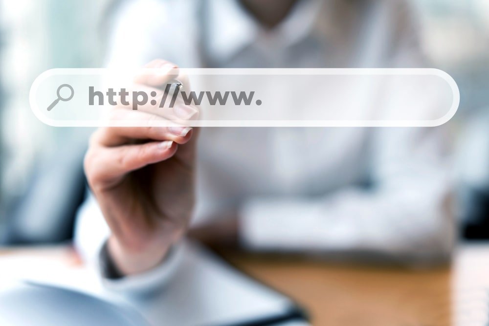 website.Visual representation of a domain name registration process with a browser search bar showing a website address.